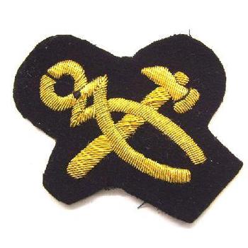 Gold wire trade badge
