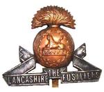 Next product: Bi Metal And Officers Infantry Cap Badge For The Lancashire Fusiliers